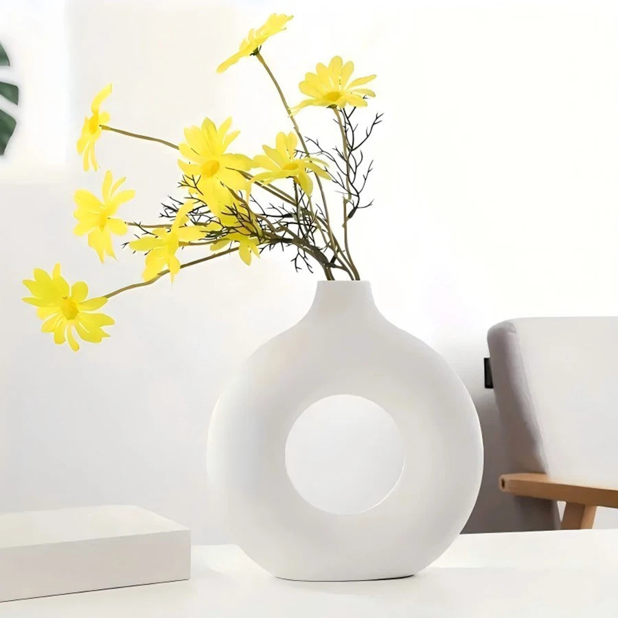 plastic donut-shaped flower vase