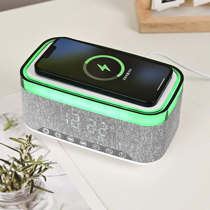 compact bluetooth speaker alarm clock on nightstand