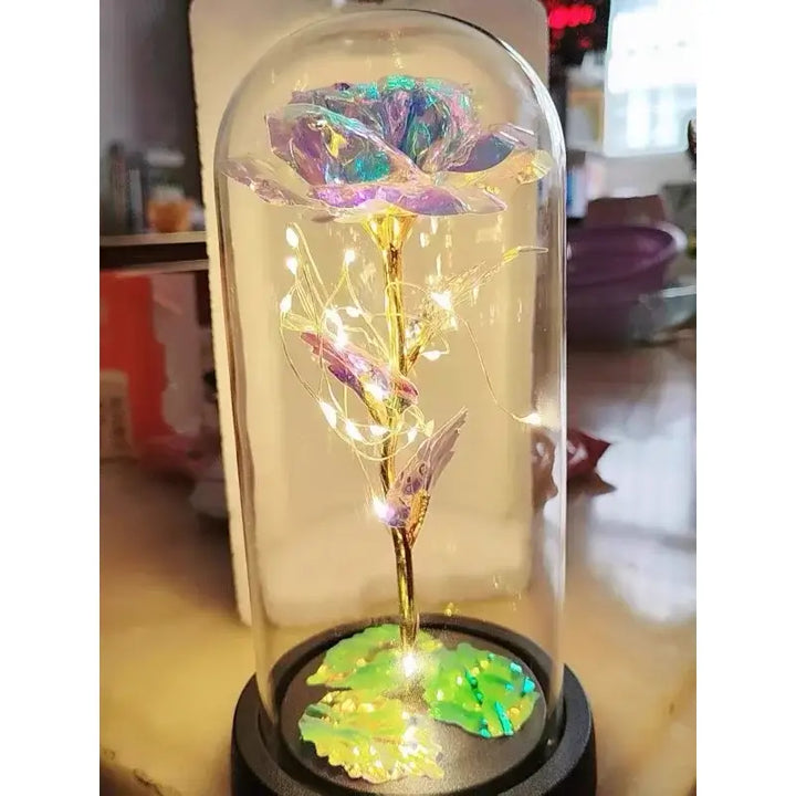 preserved rose lamp on table nightstand