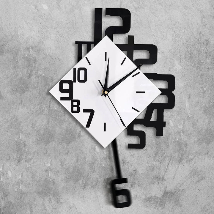 black and white wall clock with irregular numbers