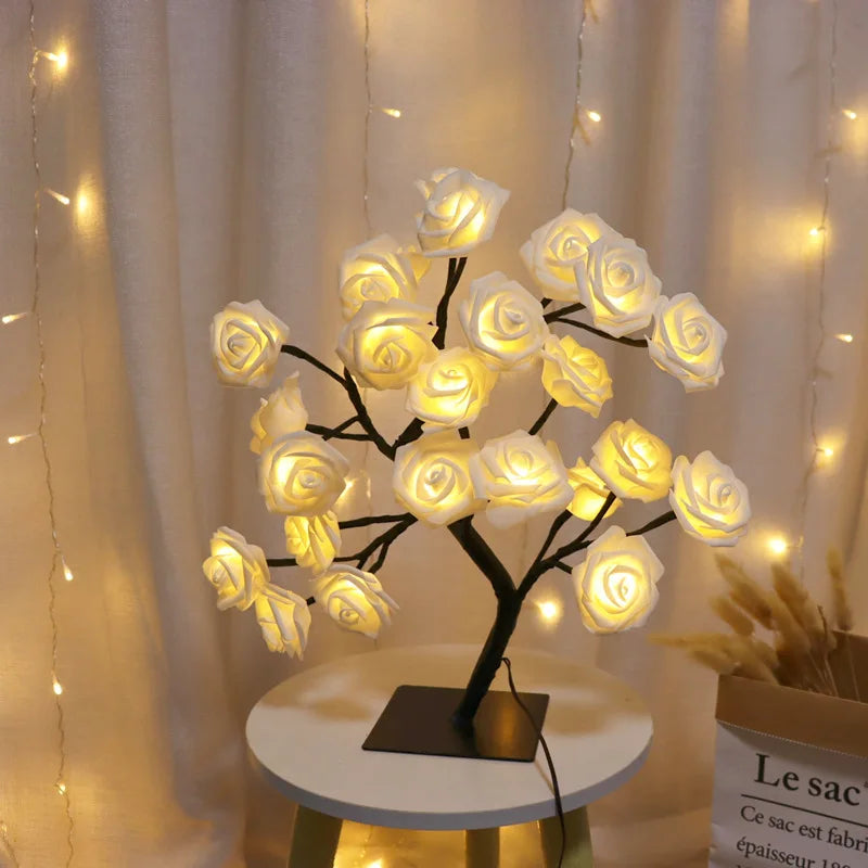 led rose tree lamp glowing on bedroom nightstand"